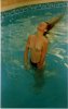 n the pool flicking her hair.jpg