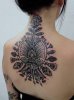 tribal-floral-pattern-tattoo-design-on-back.jpg
