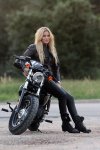 Blonde girl on motorcycle in black leather jacket and pants (2).jpg
